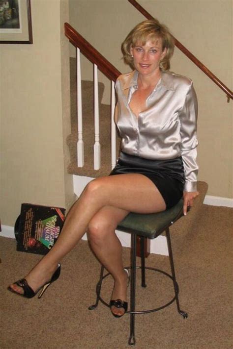 blonde mature in satin top black mini skirt wear tumbex
