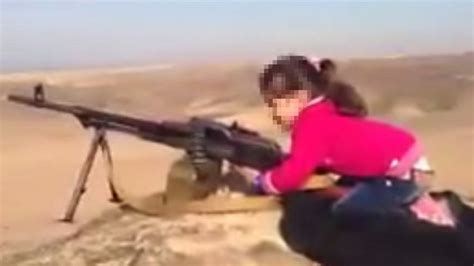 The Small Kurdish Girl Pictured Firing A Huge Machine Gun Bbc News