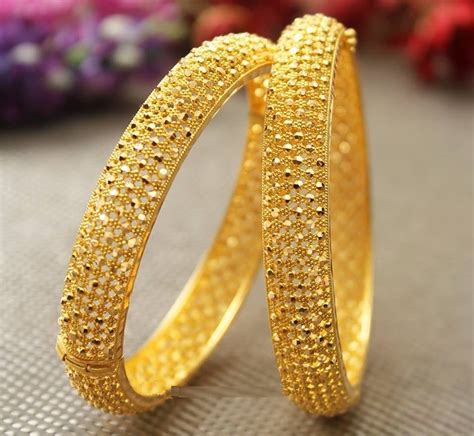 latest bangle designs  gold dhanalakshmi jewellers