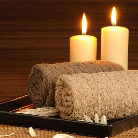 A Nice Hot Bath With Candles And Cozy Towels Massage Room Design