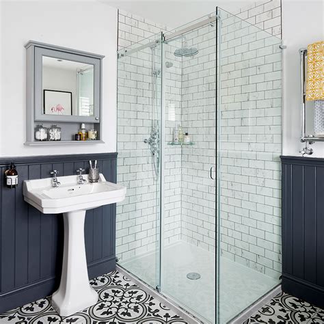 bathroom makeover  roll top bath statement floor tiles