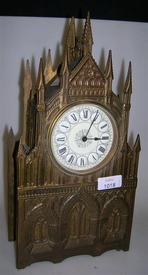 gilt brass cathedral clock price guide