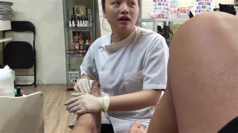 ejaculating during a pedicure from an asian girl