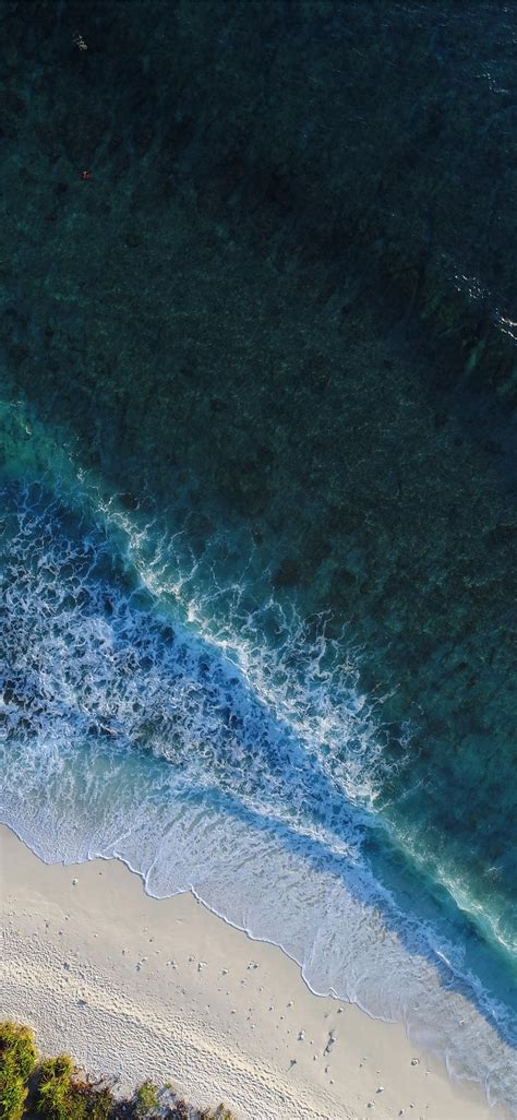 turquoise calm sea wave splashing  white sand