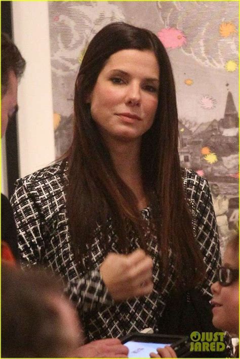 sandra bullock checks out an art show with friends on saturday night nov 19 lots more candids