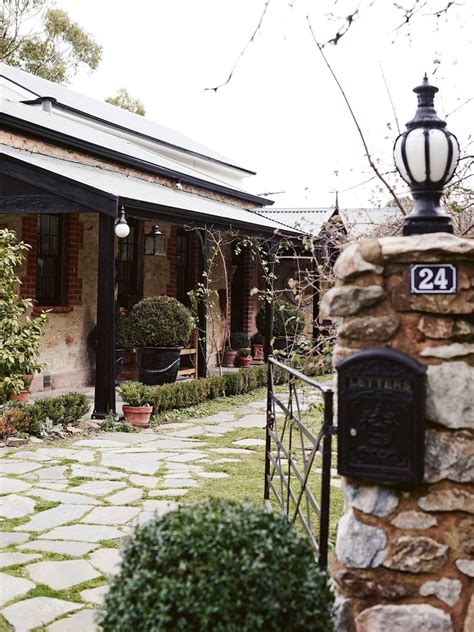 australian couple fell  love    stone cottage