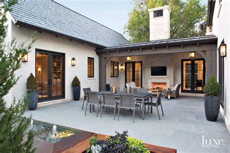 fall  love   time honored    english cottage inspired denver home courtyard