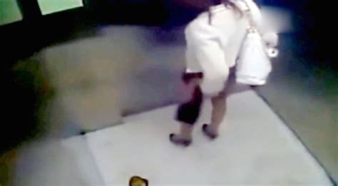 gorgeously dressed woman poo in lift then walks away as if nothing
