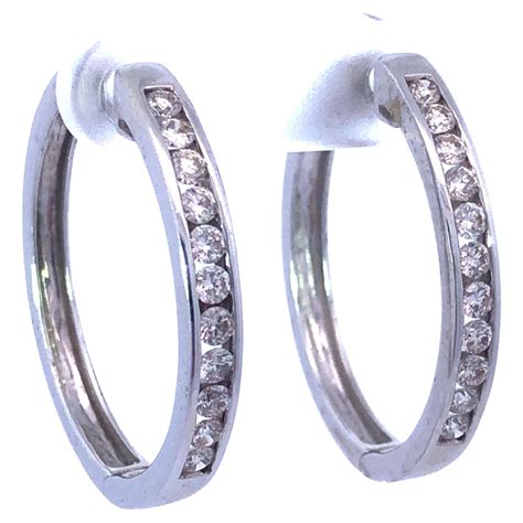 diamond flush set oval hoop earrings   solid white gold  sale