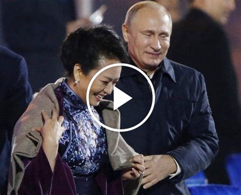 putin gives shawl to china s first lady the new york times