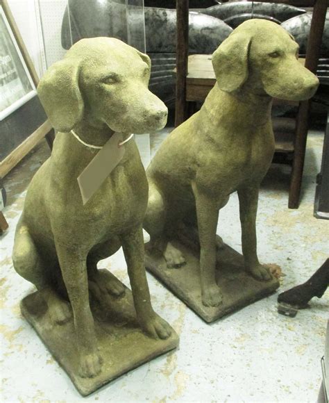 garden dog statues  pair  century cotswold stone style