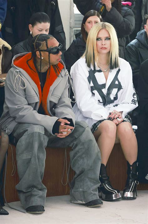 avril lavigne and tyga confirm romance with kiss at paris fashion week