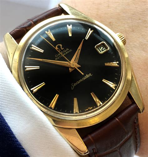 gold plated omega seamaster automatic black dial vintage portfolio