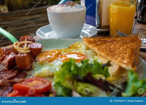 tasty breakfast in the early morning in a summer cafe sunny bright
