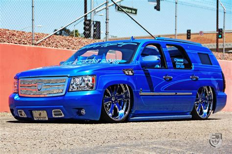 dropped royal blue chevy tahoe  color matched wheels caridcom gallery