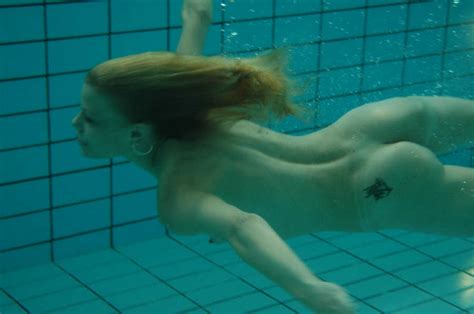 nude underwater swimming