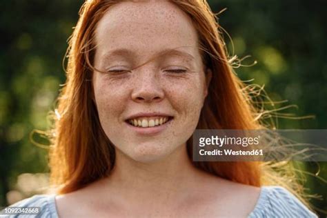 18 year old red head freckles photos and premium high res pictures