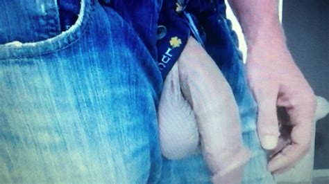 straight guy in jeans shows off his huge flaccid cock