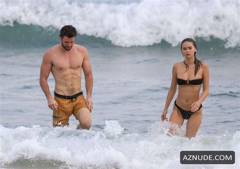 Hemsworth Shows Off His Ripped Beach Bod During A Morning
