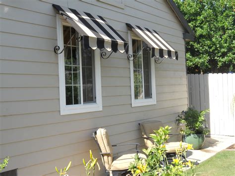 awnings  windows google search lake house pinterest window awnings window  canvases