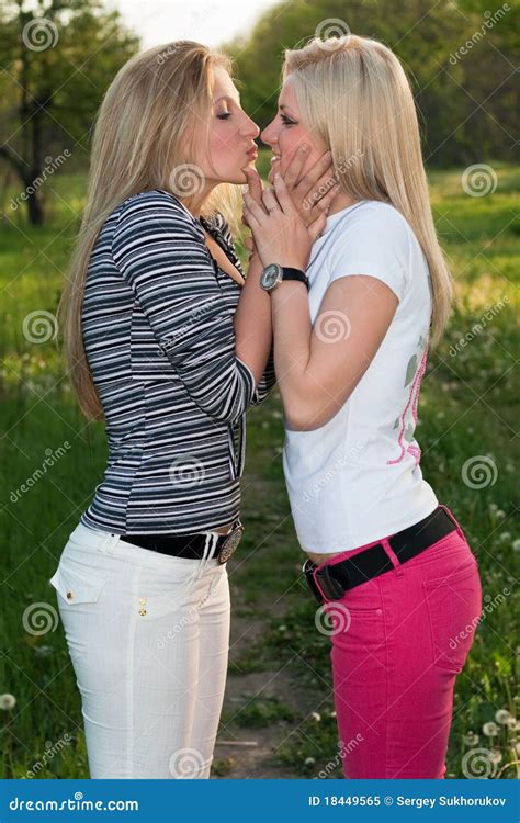 Portrait Of Two Playful Kissing Blonde Stock Image Image Of Person