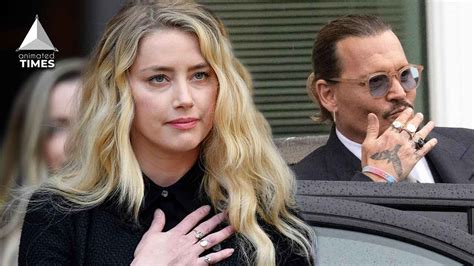 johnny depp allegedly slapped amber heard kicked her down to his