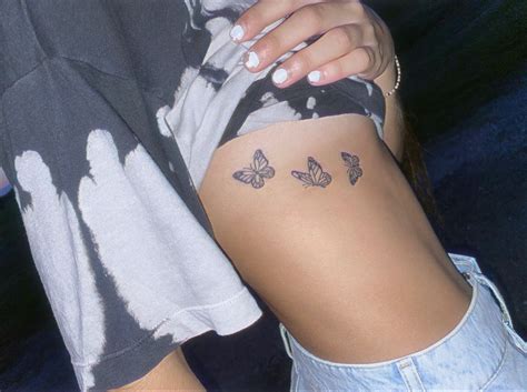 small butterfly tattoo on ribs in 2020 cute tattoos for women