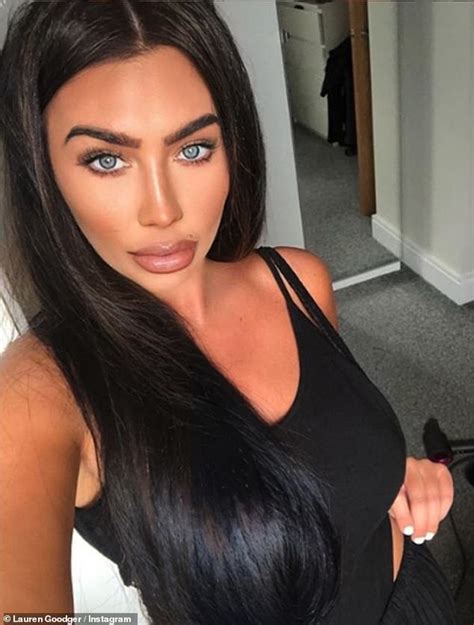 lauren goodger puts on a pouty display as she slips into satin pjs