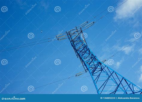 bottom view   tower  power grids  blue sky background high voltage electricity