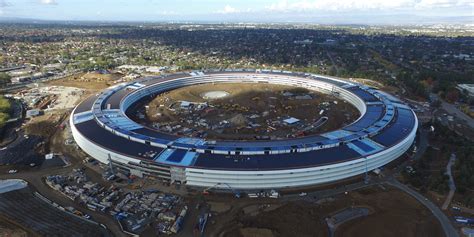 latest apple campus  stunning drone flyover video shows complete buildings wsolar landscaping