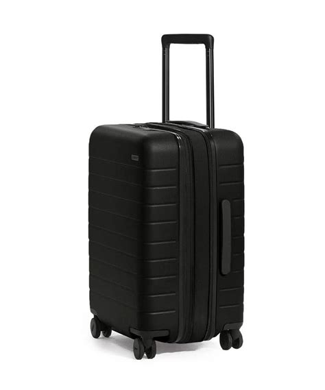 staple suitcase   carry  flex  luggage flex expandable collection popsugar