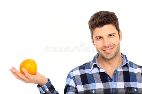 man holding  orange stock image image  indoor healthy