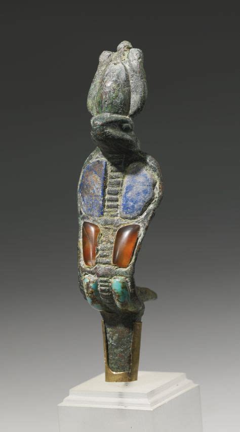 An Egyptian Bronze Uraeus Wearing The Atef Crown The