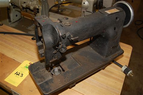 singer model  sewing machine mounted  bench serial