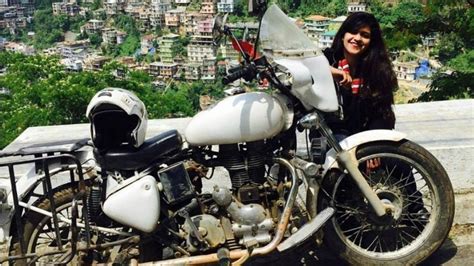 Woman Bike Rider Returns Home After Riding Solo Across The