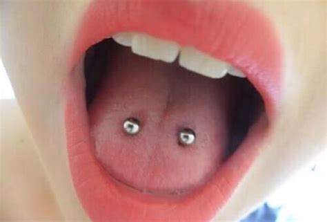 double tongue piercing horizontally aligned double tongue piercing