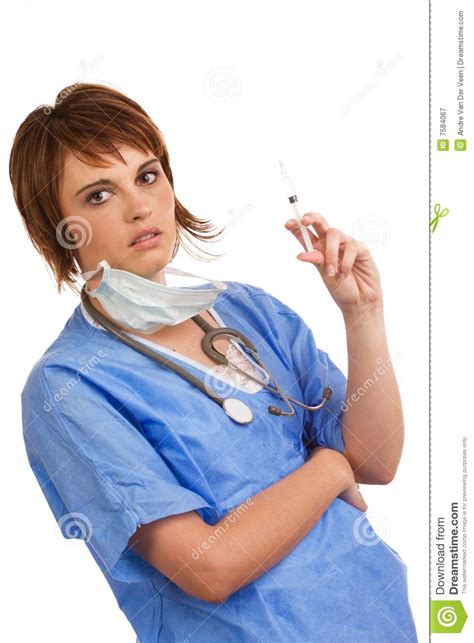 Female Nurse Holding A Filled Syringe Royalty Free Stock