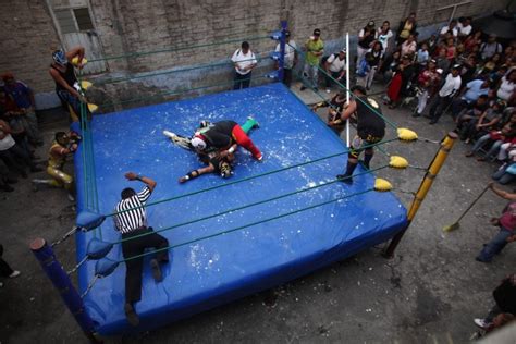 lucha libre wrestlers perform    mexicos poorest neighborhoods