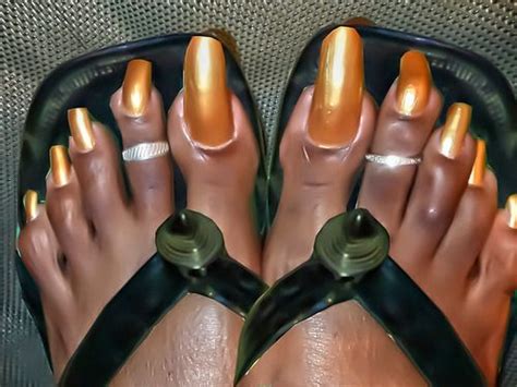 extremely long toenails very long toenails in african sandals by