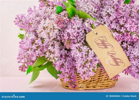 spring flowers beautiful pink blue lilac branch  basket happy