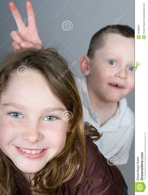 brother teasing sister stock image image 13188621