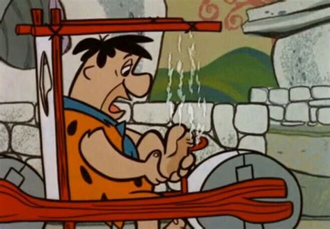 ouch fred needs some new brakes flintstones classic cartoon