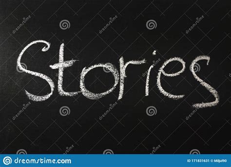stories word written  white chalk   black chalkboard stock image