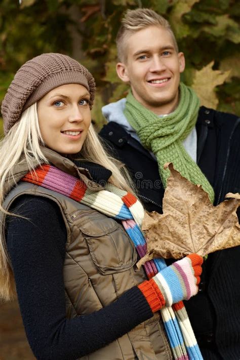 Attractive Blonde Couple At Autumn Smiling Stock Image Image Of Leaf