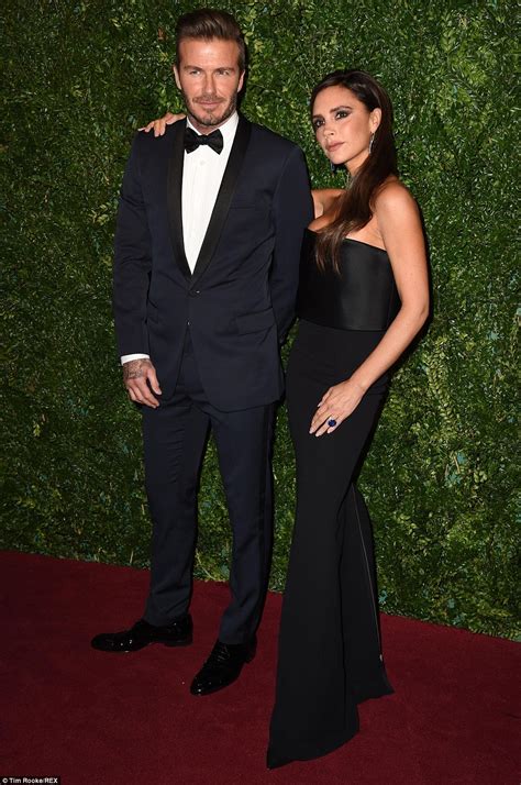 david beckham holds wife victoria s hand at the evening standard awards daily mail online