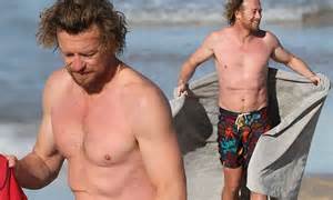 In The Swim Of It Shirtless Simon Baker Puts His Scar On Show As He