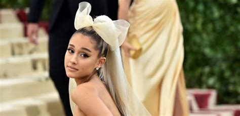 ariana grande strikes a sexy pose in sheer lace bra on