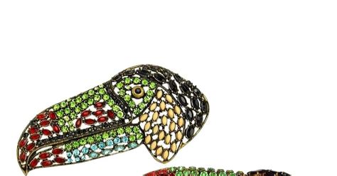 jewelry designer accuses iris apfel of knocking off her toucan brooch