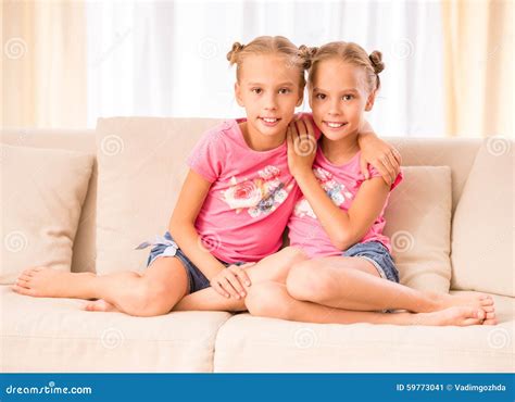 twin sisters stock image image of beautiful hugging 59773041