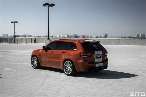 sick orange jeep grand cherokee enhanced  custom headlights carid